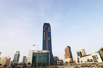 Shop Bahrain: an office tower wrapped in the festival colours, creative direction by Bashar Daas