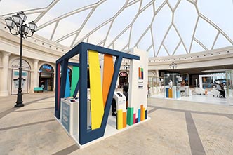 Shop Bahrain: a festival pavilion built from the colourful identity blocks, creative direction by Bashar Daas