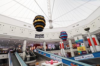 Shop Bahrain: hanging festival balloons inside a mall, creative direction by Bashar Daas