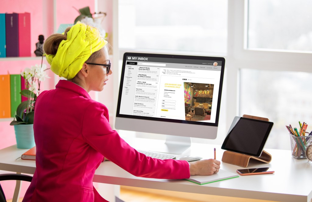 Diwan: a member using the Diwan online portal at her desk, creative direction by Bashar Daas