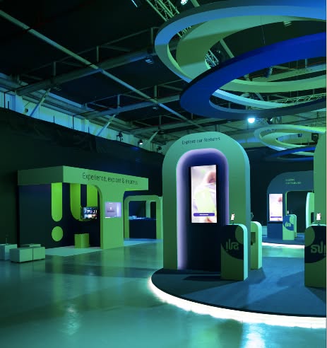 ila Bank: arch-shaped app kiosk under glowing ring lights, creative direction by Bashar Daas