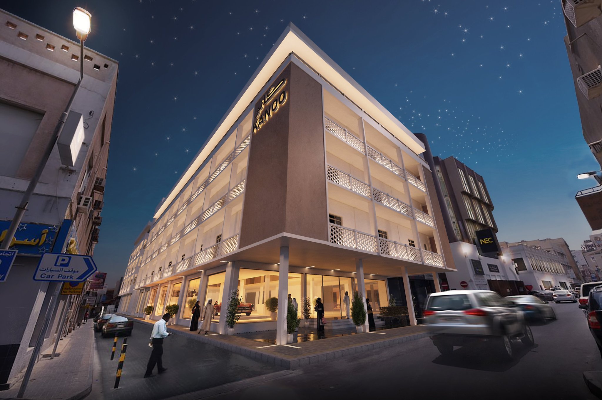 Kanoo Museum: the four-storey museum building in Manama Souq, lit at night with KANOO signage, creative direction by Bashar Daas